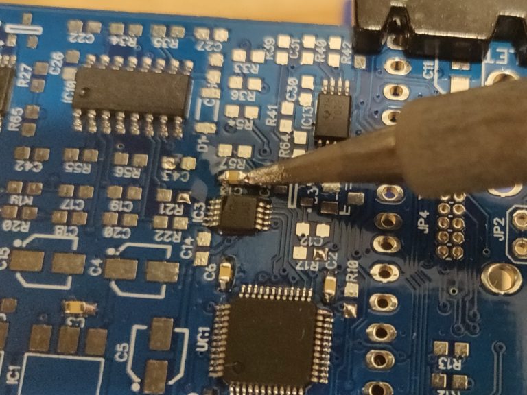 Soldering other side of component with soldering iron