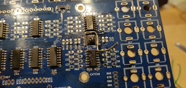 Desoldering the DAC that was placed backwards with a bent diode leg