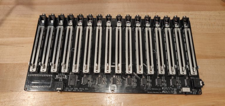 Faders installed on PCB