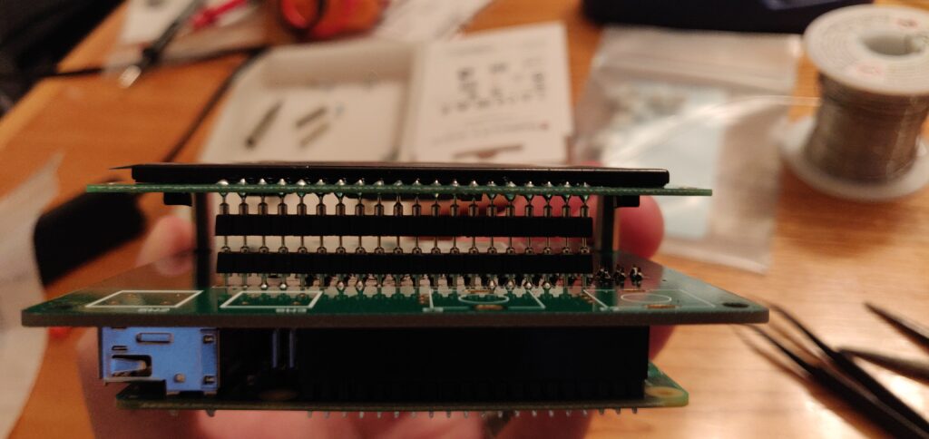 An image showing the OLED headers soldered a little off the PCB
